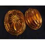 Two 19th Century Victorian copper formed jelly moulds, 1 in the form of a pineapple design and 1