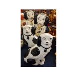 Two pairs of Staffordshire style dogs, with black body markings