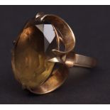 Modern 9ct gold and smoky quartz dress ring, the large faceted quartz (20 x 15mm), set in a large