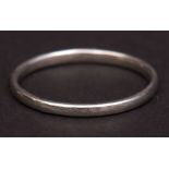 Platinum wedding ring, the thin plain polished band, stamped platinum , makers/sponsors mark WW Ltd,