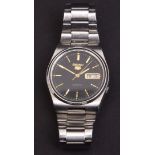 Modern Japanese automatic centre seconds calendar wristwatch, Seiko 5 , the automatic movement (