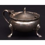 Elizabeth II lidded mustard of oval form with hinged cover, cast and applied C-scroll handle and