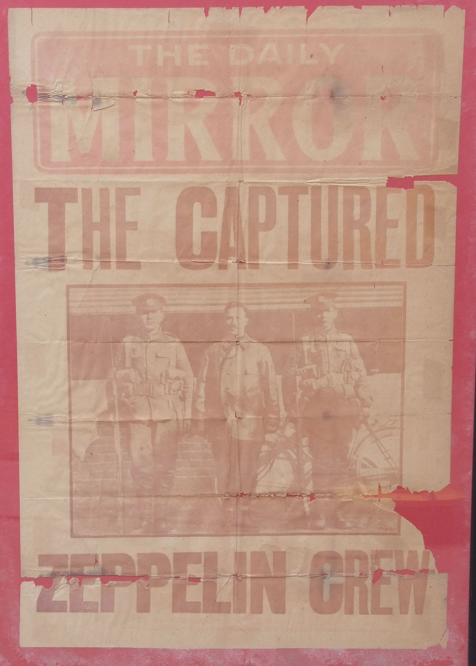 Newspaper billboard The Daily Mirror, the captured Zeppelin crew , frame 33 x 23ins