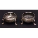 Two late George II cauldron salts, each of polished circular form with reeded rims and each raised