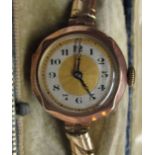 9ct gold ladies dress watch, the jewelled movement to a silvered and gilt Arabic dial with outside