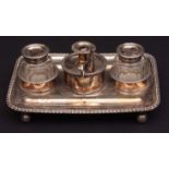 19th century silver on copper desk stand of rectangular form with cast and applied gadrooned border,