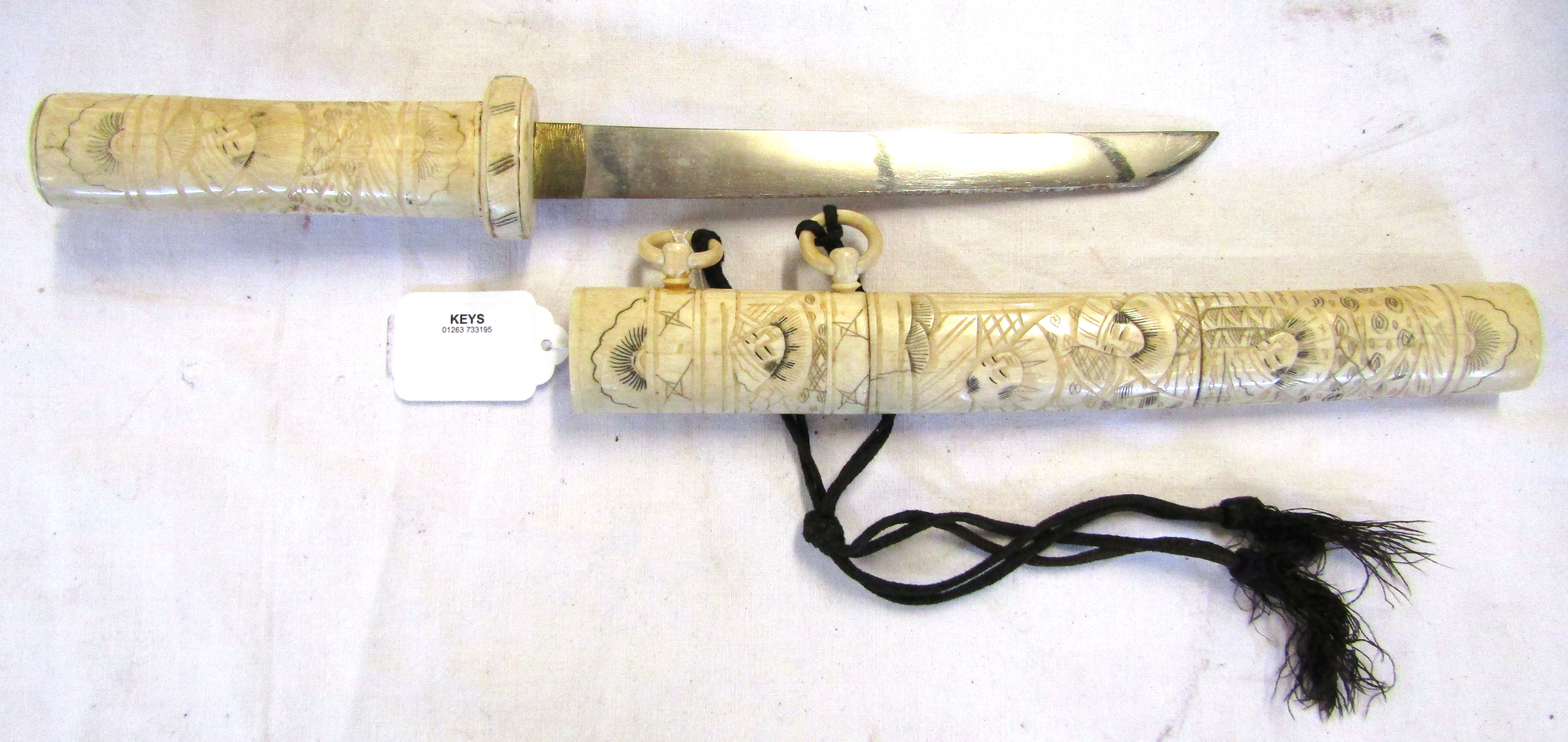 Late 19th/early 20th century Japanese decorative dagger with carved bone handle and sectional