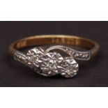 Precious metal three stone diamond crossover ring, the three small single cut diamonds claw set in a