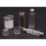 Mixed Lot: five various silver lidded and clear cut glass toiletry bottles, together with further