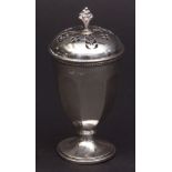 George V table caster of faceted circular form with pierced pull off cover and cast and applied