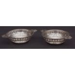 Two George V bon-bon dishes, each of circular form with pierced galleries and cast and applied