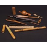 Mixed Lot: baluster turned wooden whistle, together with two various Mauchline ware type needle