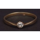 Modern yellow metal and solitaire diamond ring, the small brilliant cut diamond (0.20ct approx),