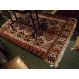 Multi coloured Kelim floor rug with cream field and geometric designs throughout, 52ins x 78ins