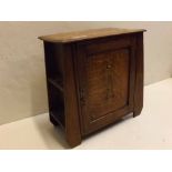 Arts & Crafts oak smokers cupboard with single door with side pipe holders, 14ins wide x 14ins deep