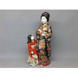 20th century Japanese figure group of a mother and her daughter in gilded kimonos (repair to