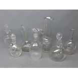 Mixed Lot: seven 19th/20th century clear glass decanters and ewers, to include a three-ringed mallet