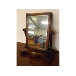 Victorian mahogany dressing table mirror with serpentine front base raised on pad feet with