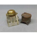 Edwardian bevelled, square glass inkwell, the hinged brass lid formed as a jockey?s cap, 5 + cm x