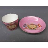 19th century puce ground Royal commemorative cup and saucer with inscription In commemoration of the