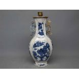 Late 19th/early 20th century blue and white twin-handled vase with raised lozenges of Oriental views