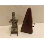 Vintage tin plate viewer together with a further Swiss made Dulcet metronome (2)