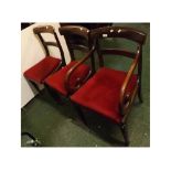 Set of three Victorian mahogany bar back dining chairs comprising two dining chairs and a scroll arm