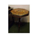 19th century octagonal top table with floral marquetry inlay on a fluted column, terminating on a