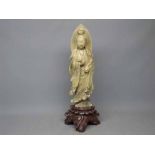 Oriental large green soapstone carved figure of a Geisha girl on a rust carved floral soapstone base