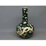 19th century Oriental bulbous vase with black ground, green dragon design, six printed character
