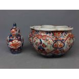 19th century Imari decorated shaped jardini re, (a/f), together with a further similar lidded