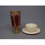 Belleek tea cup and saucer with black printed mark to base, together with a further Bohemian ruby