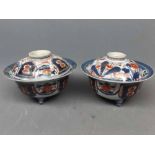 Pair of 19th century Chinese export circular lidded bowls decorated in Imari colours, each 6ins diam