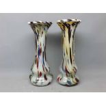 Pair of Studio mottled glass trumpet vases with raised relief, 12ins tall