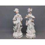 Pair of late 19th century German figures of a lady and gent painted predominantly in white with