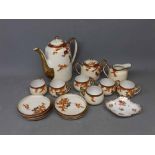 Noritake tea set with decorative gilt handle and spout with bird of paradise among foliage