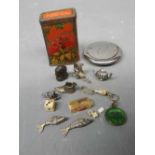 Mixed Lot: assorted white metal fobs in the form of a shoe, a teapot, an articulated fish, a