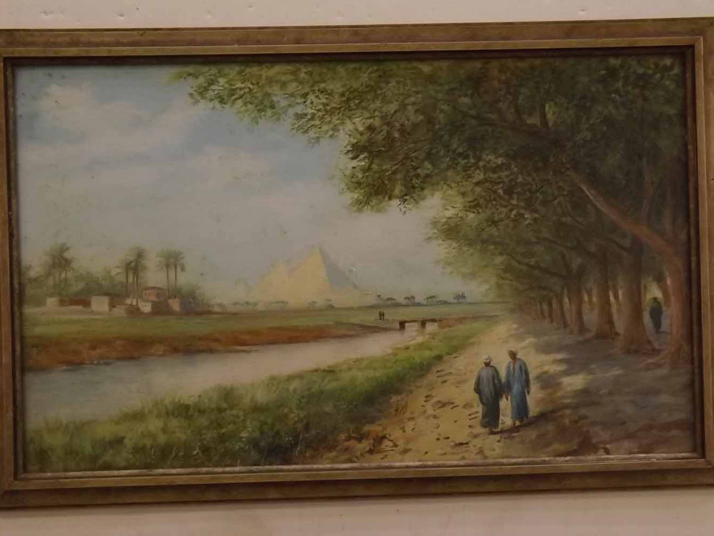 Emiles Morchottiol?, signed watercolour, Middle Eastern scene with figures and pyramids, 11 x 18ins