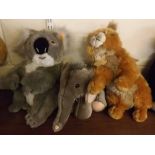 Two modern Steiff soft toys modelled as a koala and an elephant, together with a further Herman N