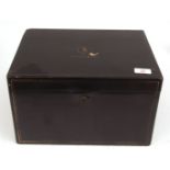 Large Chinese black lacquer tea box with pewter liner, the lid with a crane armorial and the name