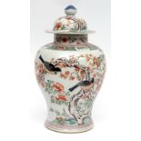 Chinese porcelain vase and cover decorated in Kangxi style famille vert enamels with birds in