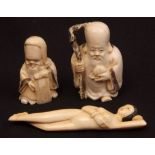 Three Japanese ivory netsuke, all early 20th century, Chinese style doctor s lady, Fukurokuju with