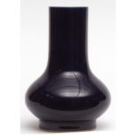 Chinese monochrome porcelain vase, the exterior with an even dark blue glaze, the base with six