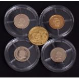 Packet of five assorted 2008 World s Smallest Gold coins , each with certificates