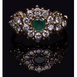 Emerald and diamond cluster ring, the circular cut emerald bezel set within a brilliant cut