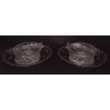 Pair of oval flat cut two-handled butter dishes and stands, Low Countries circa 1780, 7ins wide