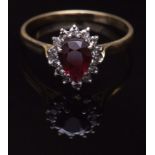 Mid-20th century 18ct gold ruby and diamond cluster ring, the pear shape faceted ruby (8 x 5mm