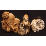 Three Japanese ivory netsuke, all early 20th century, Daigoku seated holding a peach and his sack;