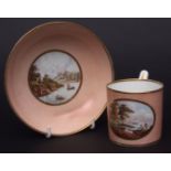 Derby tea cup and saucer, painted with views of Cowes Castle, Hampshire and Windsor on a salmon