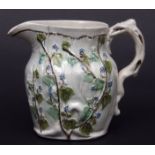 English Pearl ware jug, with moulded and embossed decoration with fruiting vines, 5ins high